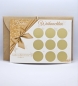 Preview: Weihnachts-Rubbelkarte mit 9 Feldern und goldenen Rubbelstickern, edles Design mit weihnachtlicher Schleife.